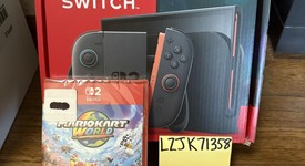 New
													Nintendo Switch 2 - Red & Blue, Standard, photo 1 of 2