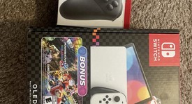Mint
													Nintendo Switch - OLED - White, 64 GB, photo 1 of 2