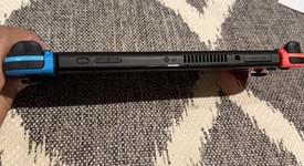 Mint
													Nintendo Switch - OLED - Red & Blue, 64 GB, photo 5 of 12