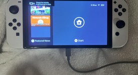 Mint
													Nintendo Switch - OLED - White, 64 GB, photo 4 of 13