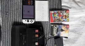 Mint
													Nintendo Switch - OLED - White, 64 GB, photo 1 of 6