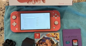 Mint
													Nintendo Switch Lite - Coral, photo 1 of 10