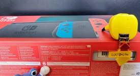 New
													Nintendo Switch - Red & Blue, 32 GB, photo 2 of 3