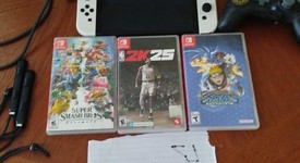 Good
													Nintendo Switch - OLED - Black, 64 GB, Super Smash Bros., photo 1 of 3