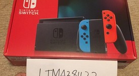 New
													Nintendo Switch - Red & Blue, 32 GB, photo 2 of 2