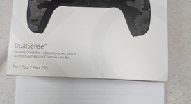 New
													DualSense Wireless Controller - Camo, photo 1 of 3