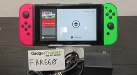 Fair
													Nintendo Switch - Pink & Green, 32 GB, photo 1 of 8