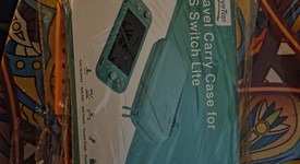 Mint
													Nintendo Switch Lite - Coral, photo 1 of 15