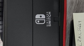 Good
													Nintendo Switch - OLED - Black, 64 GB, Super Smash Bros., photo 2 of 11