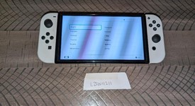 Good
													Nintendo Switch - OLED - Black, 64 GB, Super Smash Bros., photo 2 of 3