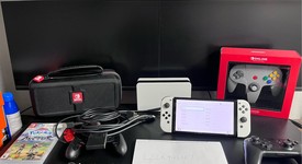 Good
													Nintendo Switch - OLED - White, 64 GB, photo 1 of 4