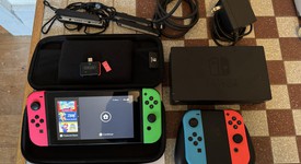 Fair
													Nintendo Switch - Pink & Green, 32 GB, photo 1 of 4