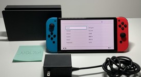 Good
													Nintendo Switch - OLED - Red & Blue, 64 GB, photo 1 of 9