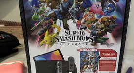 Good
													Nintendo Switch - OLED - Black, 64 GB, Super Smash Bros., photo 3 of 13