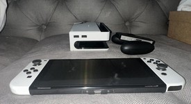 Mint
													Nintendo Switch - OLED - White, 64 GB, photo 3 of 11