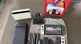 Mint
													Nintendo Switch - OLED - White, 64 GB, photo 2 of 6