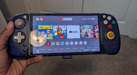 Fair
													Nintendo Switch - OLED - Black, 64 GB, Super Smash Bros., photo 3 of 7