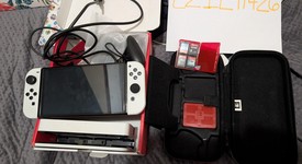 Good
													Nintendo Switch - OLED - White, 64 GB, photo 1 of 8