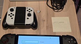 Good
													Nintendo Switch - OLED - White, 64 GB, photo 1 of 3