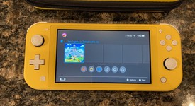 Mint
													Nintendo Switch Lite - Yellow, photo 2 of 11