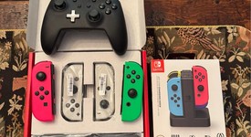 Mint
													Nintendo Switch - OLED - White, 64 GB, photo 3 of 11