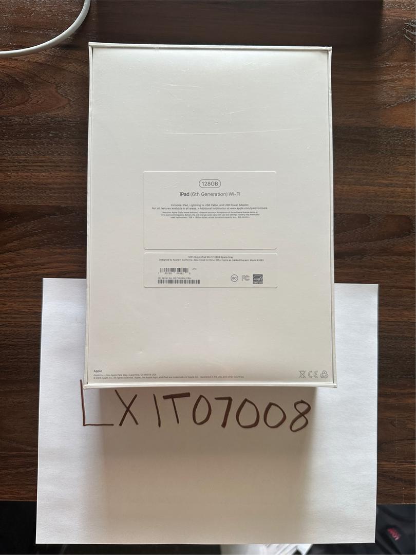 Apple iPad 6th Gen, color Gray