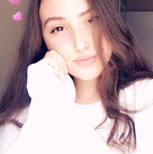 Xheni A.